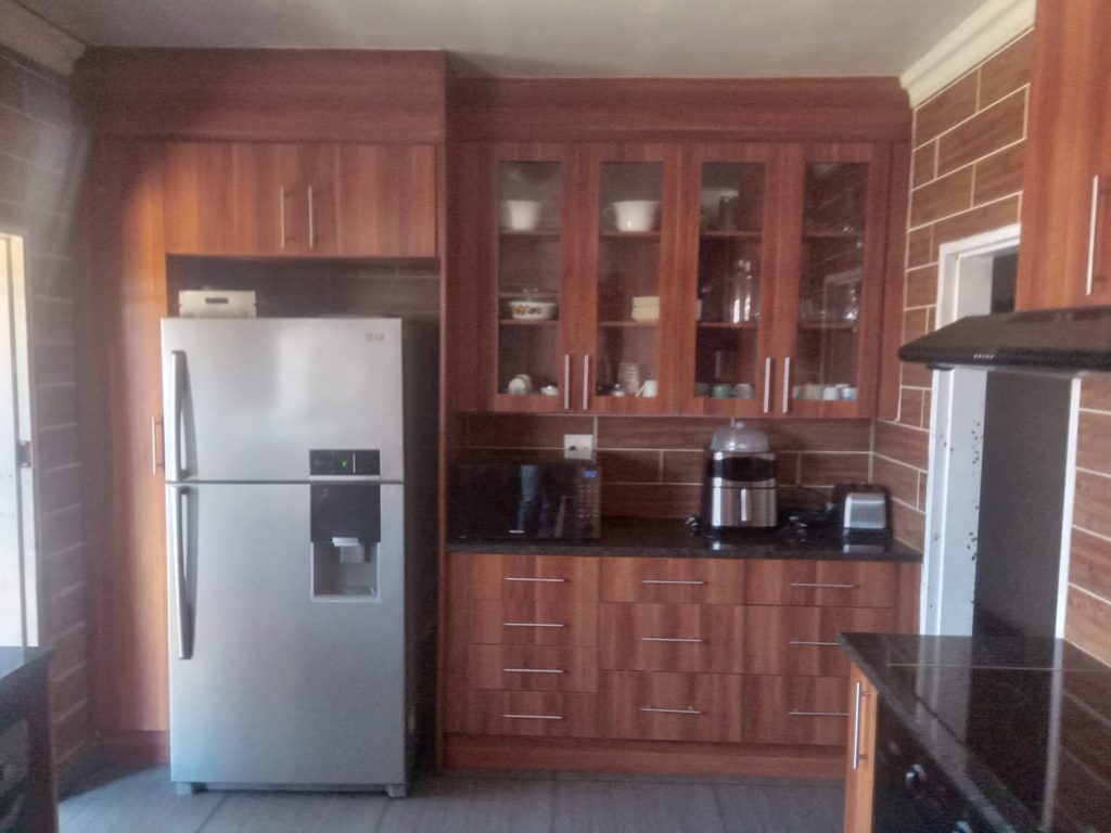 4 BEDROOM FAMILY HOME FOR SALE IN RHODESFIELD, KEMPTON PARK – WITH INCOME-GENERATING COTTAGE, POOL & LAPA 1000408079