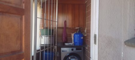 4 BEDROOM FAMILY HOME FOR SALE IN RHODESFIELD, KEMPTON PARK – WITH INCOME-GENERATING COTTAGE, POOL & LAPA 1000408095