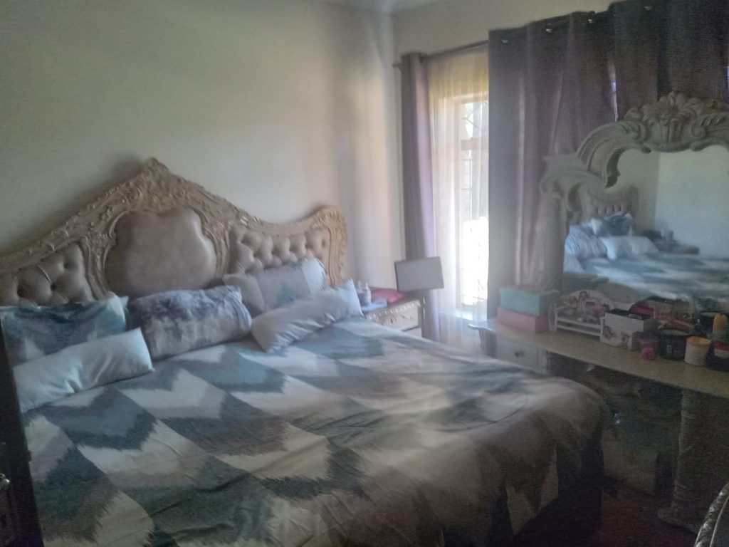 4 BEDROOM FAMILY HOME FOR SALE IN RHODESFIELD, KEMPTON PARK – WITH INCOME-GENERATING COTTAGE, POOL & LAPA 1000408120